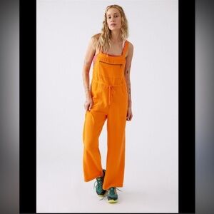 Urban Outfitters Tine Orange Gauze Jumpsuit Adjustable Straps Zip Pockets Size L